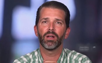 bearded man speaking interview